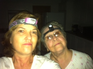 My sister and mother coping with having no electricity or running water after being allowed to return home.